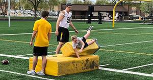 Iowa youth football clinic lets junior Hawkeyes emulate thei